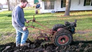 Hezekiah plowing with a David Bradley