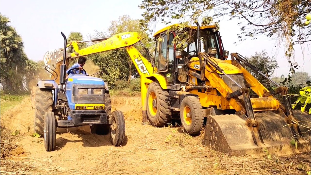 New Jcb 3dx Backhoe Loader Machine Loading Red Mud In Sonalika 35 Di