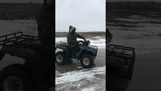 Kawasaki Bayou 220 4 wheeler STUCK ON THE ICE!!!