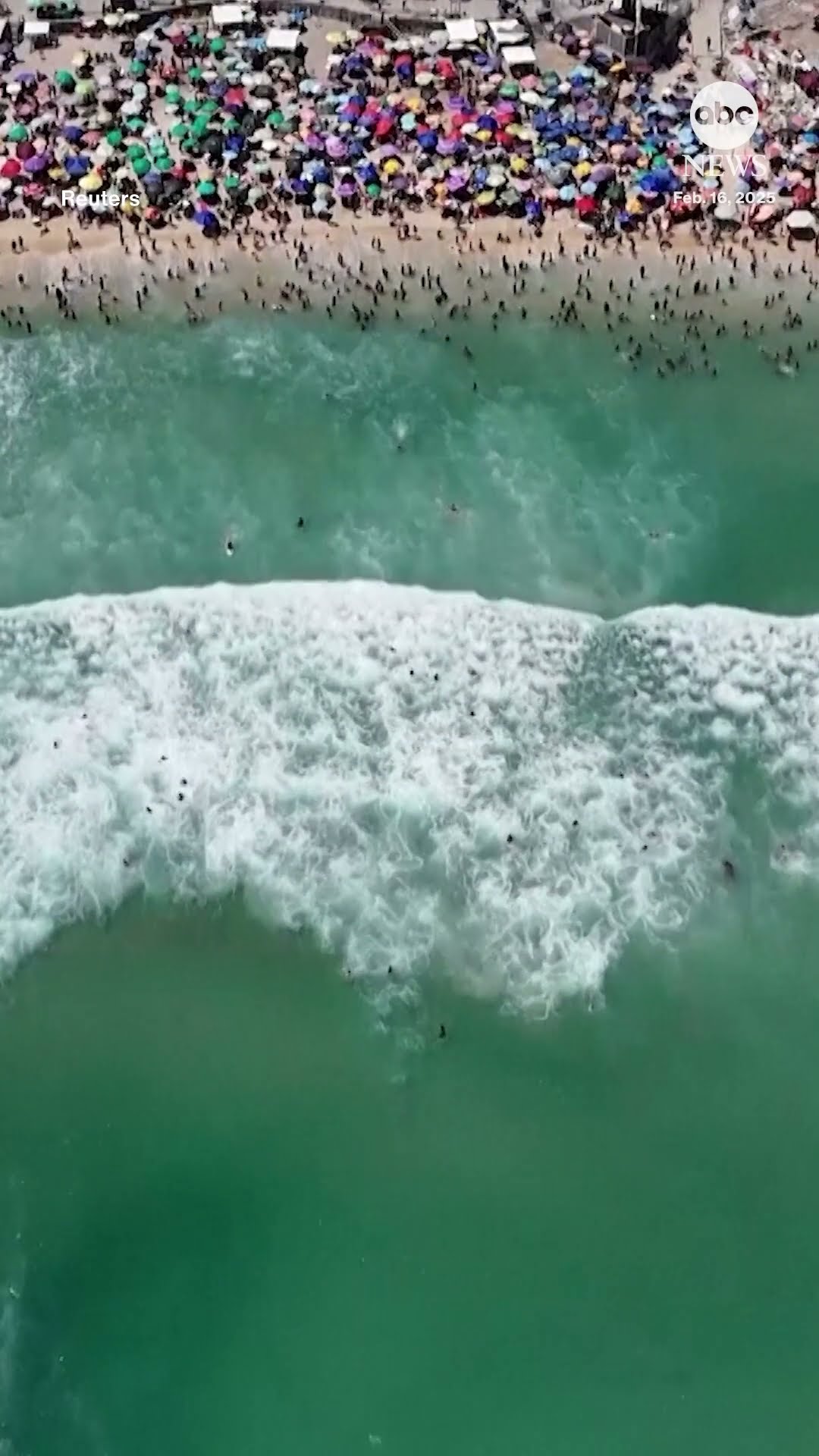 Drone footage captures aerial view of packed Rio de Janeiro beach