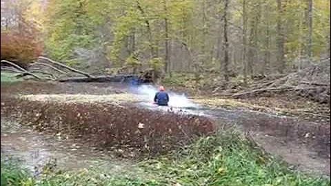 DUMB idea Skidoo sinks to bottom Dave'sFarm   Polaris in the Creek