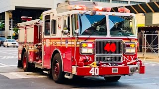 FDNY ENGINE 40 RESPONDING FROM QUARTERS ON WEST 66TH STREET ON WEST SIDE OF MANHATTAN, NEW YORK CITY