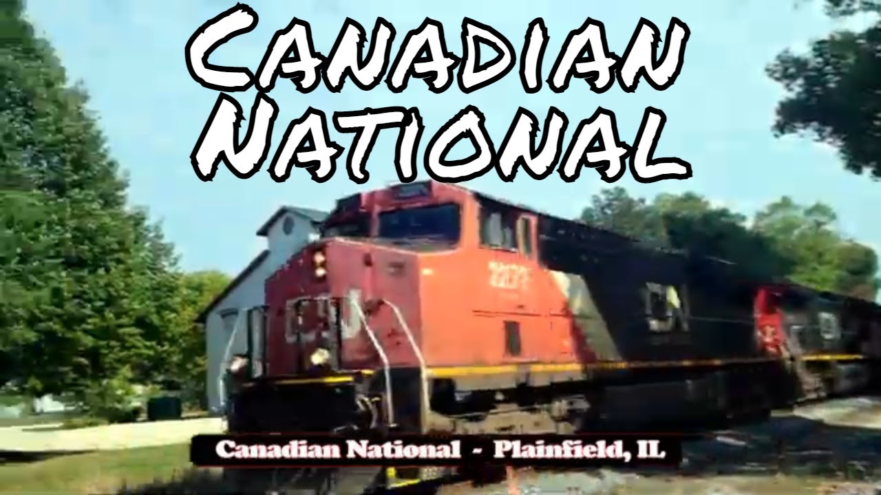 A Canadian National Train Hauling Freight North Through Downtown Plainfield, Illinois