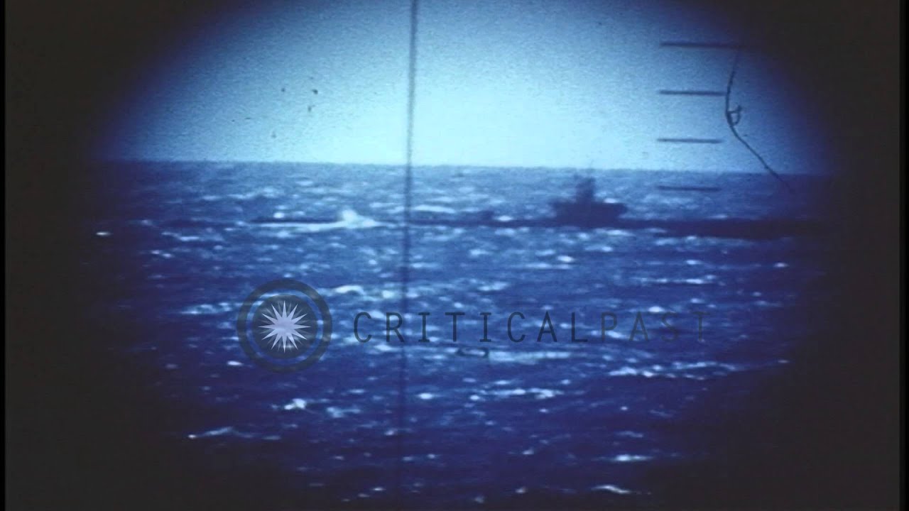 A periscope view of a Japanese submarine underway and exploding in the Pacific Oc...HD Stock Footage