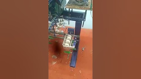 thread winding machine for reel tube /sewing thread with lubricants attachment and lay attachment.