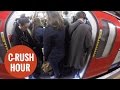 Commuters packed together on the london underground