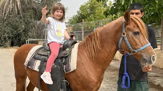 Yana rides a horse 🐎