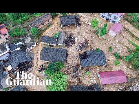 China Landslide Sweeps Cars Away As Floods Kill Dozens