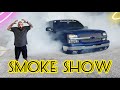 Bagged cateye Silverado smokes the tires in a burnout!