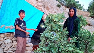 Homeless mother builds door to cave to keep wild animals out