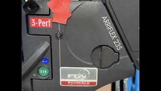 Loading 235 shoulder mag into a 235 camera