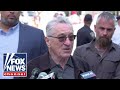 Robert de niro shouted down during biden campaign press briefing