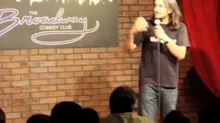 Aasif Mandvi from The Daily Show introduces comedian Papa CJ in New York