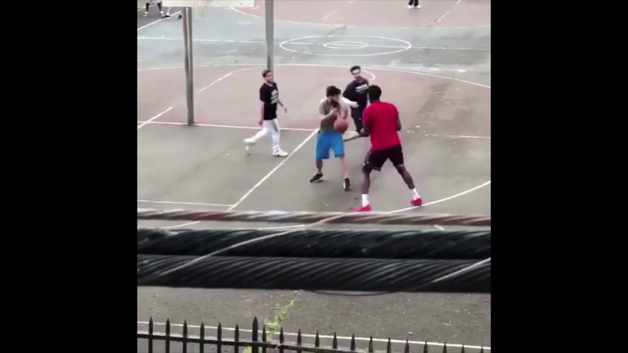 Joel Embiid bounces ball off guy's head and then windmills! YouTube