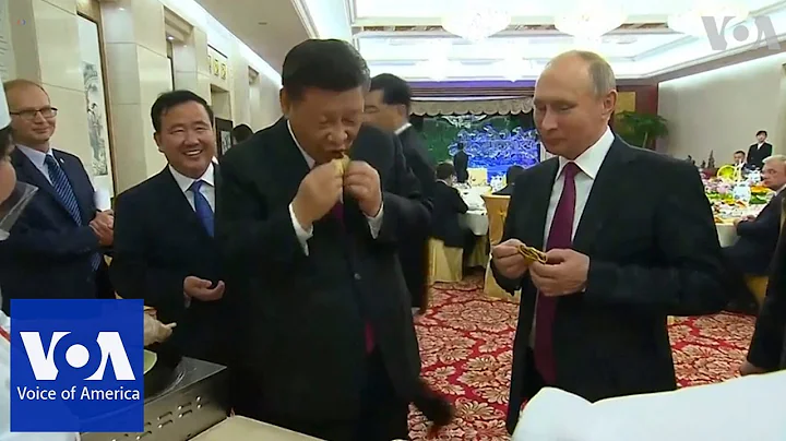 Russia's Putin and China's Xi Jinping learn to make Chinese dumplings | VOANews - DayDayNews