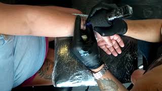 👉small cross tattoo on hand.👈.....around wrist and onto hand