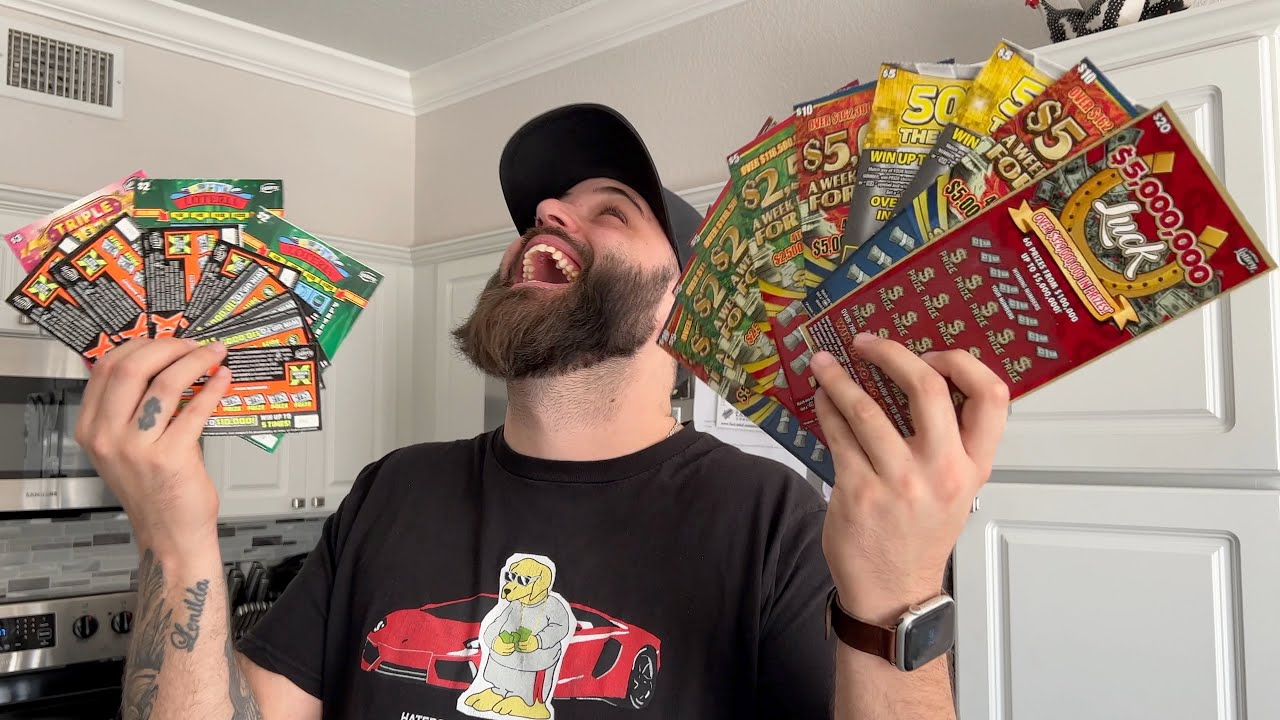 JOGUEI 100$ NAS RASPADINHAS DOS ESTADOS UNIDOS E GANHEI...