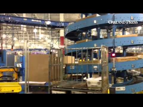 Low cost tray system at Michigan Metroplex for USPS.