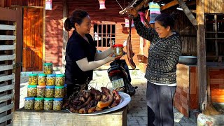 With their skillful hands, MAI & NHAT make pickled figs and dried pork to sell.