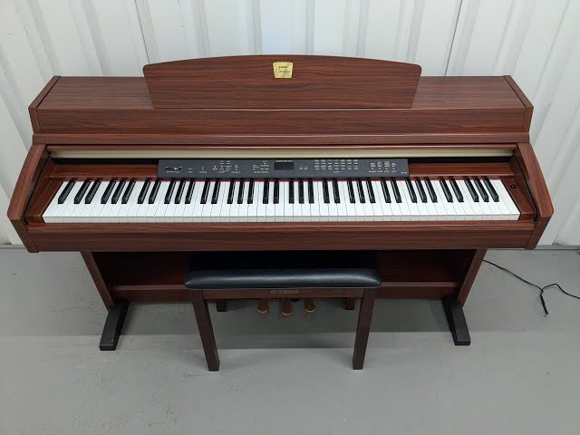 Yamaha Clavinova CLP-230 digital piano and stool in mahogany Yamaha Clavinova CLP-230 digital piano and stool in mahogany