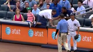2012/08/03 Fan tumbles onto field
