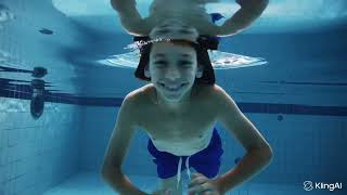 Boy Underwater In The Pool