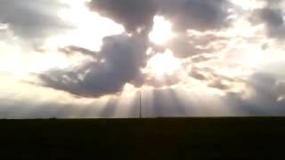 Sunrays Break Clouds