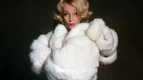 Marlene Dietrich sings "Everyone's Gone to the Moo...