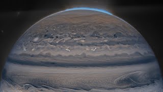 Снимок Юпитера, на котором видны полярные сияния, кольцо и два спутника