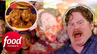 Casey Starts To Lose It While Eating These Jerk Wings Smothered In Ghost Pepper Sauce | Man V Food