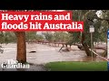 Heavy rain leaves Alice Springs flooded with Australia's eastern states on alert for wild weather
