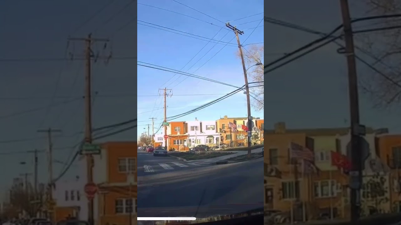 Distracted driver runs a stop sign almost causing an accident 
