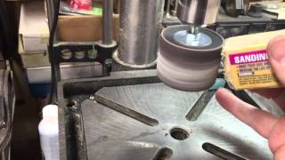 abrasive belt cleaner