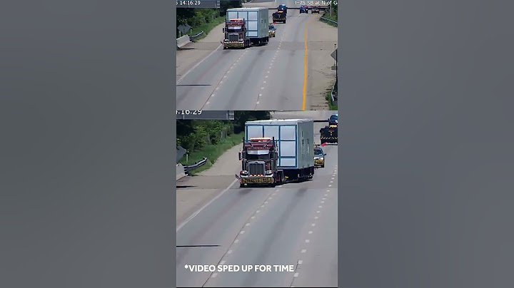WATCH: Oversized truck forced to reverse off highway after getting stuck