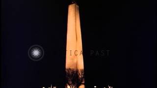 The Jefferson Memorial and Washington Monument lit up at night in Washington DC. HD Stock Footage