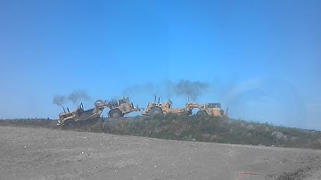 627f scraper almost flipped over.