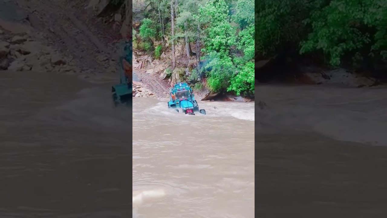 Tractor crossing river . Part 2