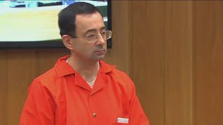 Disgraced doctor Larry Nassar stabbed multiple times in prison, AP sources say