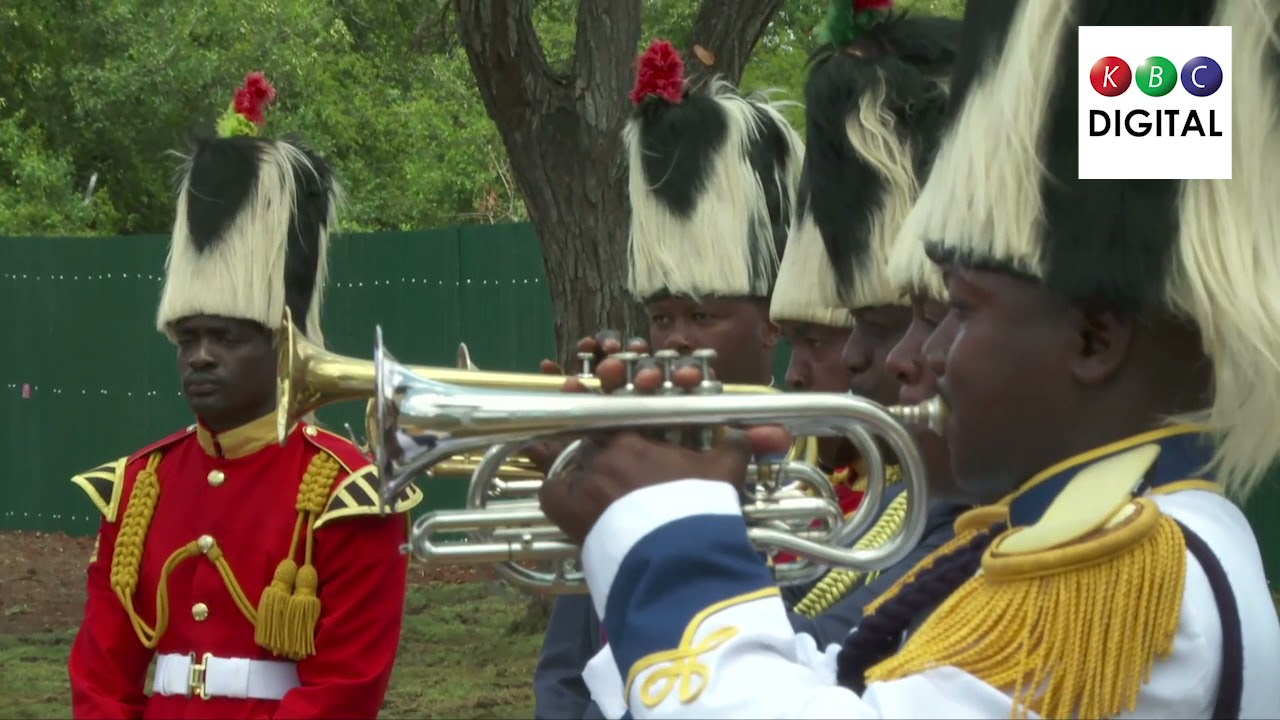 Uhuru Kenyatta laying a wreath at Kenya Navy Base,  Manda Bay