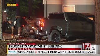 Driver hurt after truck crashes into Raleigh apartment, police say