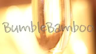 Extreme close-up of champagne glasses in trendy yellow tones. Gas bubbles in sparkling wine, smooth