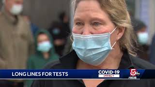 Long lines of people wait for COVID-19 tests as demand surges