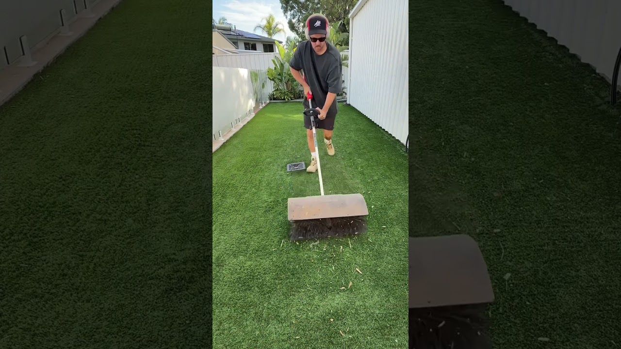 Milwaukee power brush cleaning fake grass