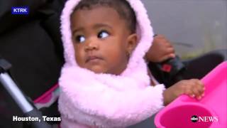 Baby rescued from houston flooding | abc news
