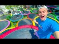 I PUT 30 TRAMPOLINES IN MY BACKYARD!! (DIY Trampoline Park)