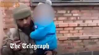 Footage From Chechen Warlord Shows His Forces Bombarding High-Rise And Rescuing Children