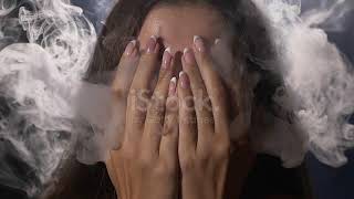 Young Women Covering Her Face By Hands And Exhaling Lot Of Smoke Through Fingers Stock Video Downl