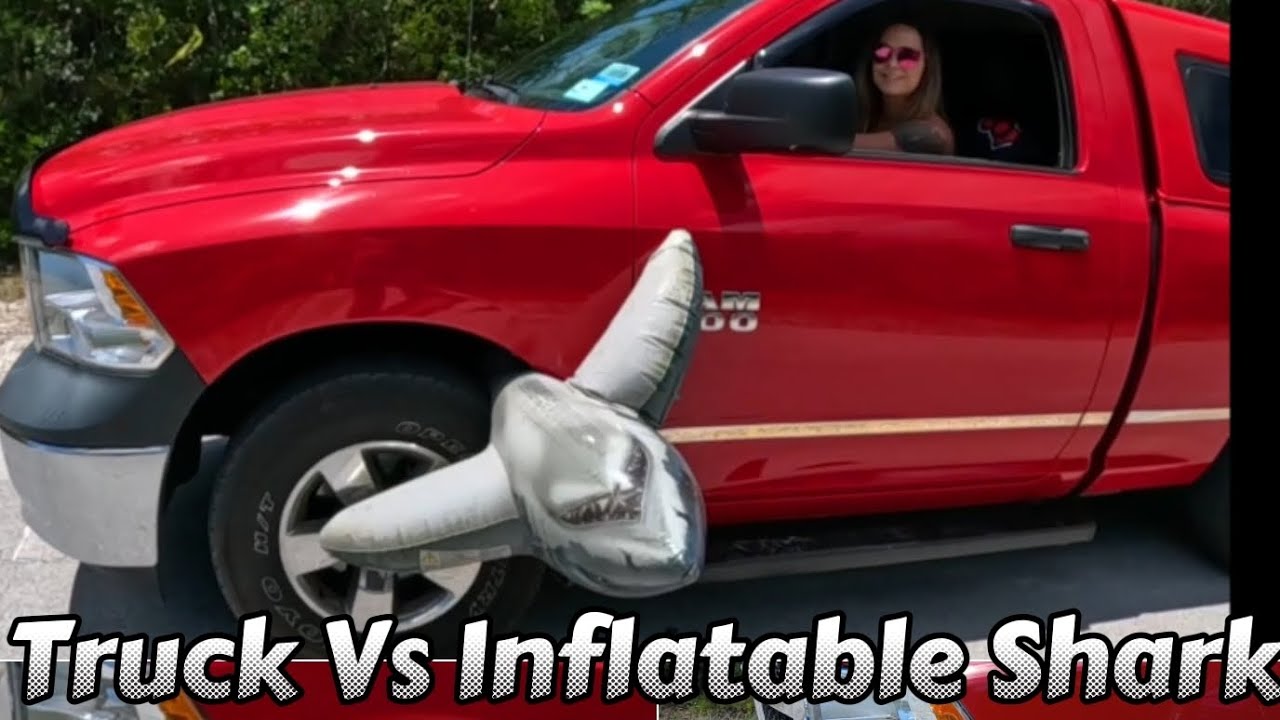 TRUCK VS INFLATABLE SHARK POOL TOY 