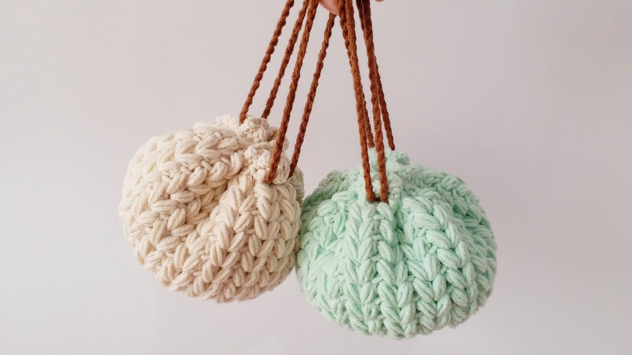 钩针编织，这个束口袋好像大包子啊，可爱爆表令人爱不释手！