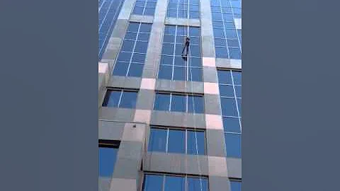 Lisa Hagan Rappells down the side of 30 story buil...